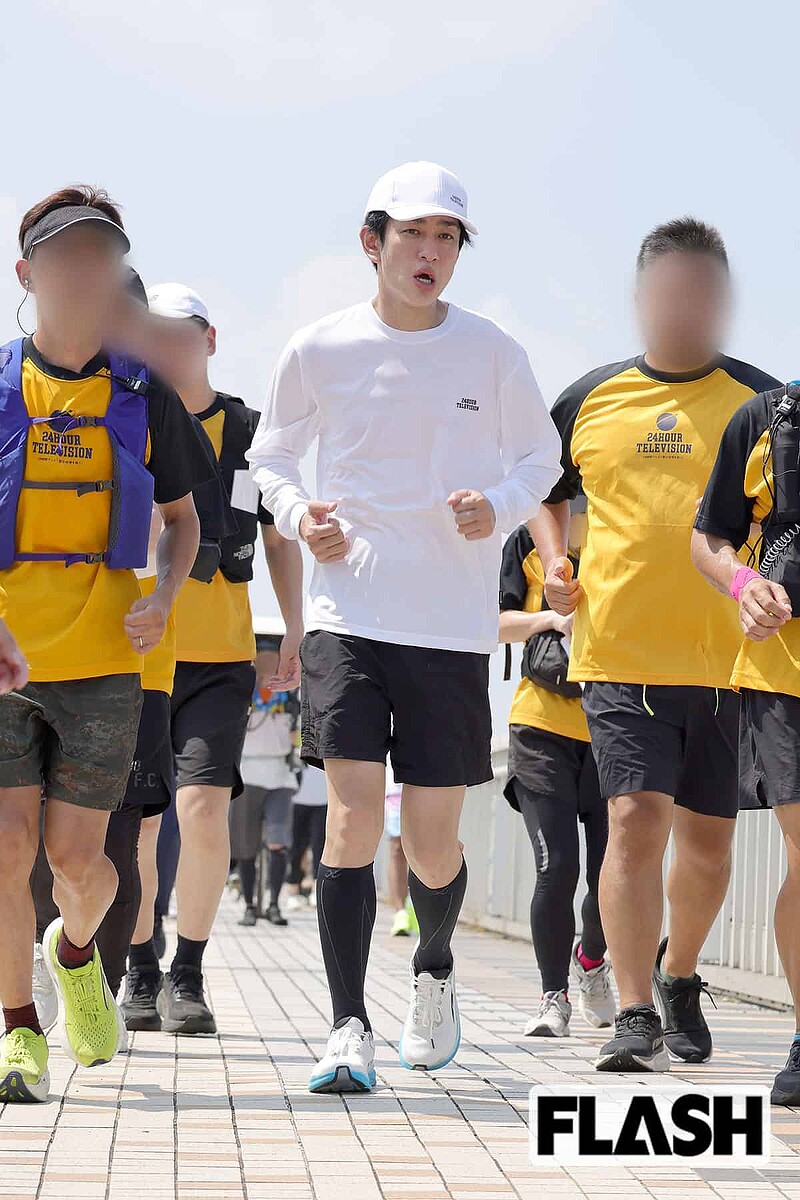  チャリティーマラソンを走る横山裕 