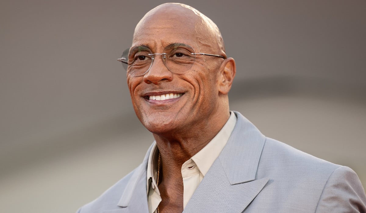 Photo by Harald Krichel https://commons.wikimedia.org/wiki/File:Dwayne_Johnson-1764.jpg Remixed by THE RIVER