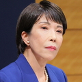 高市氏の横でTVに映りまくり話題