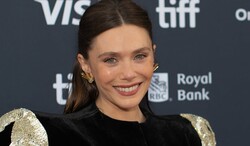 Photo by John Sears https://commons.wikimedia.org/wiki/File:Elizabeth_Olsen_at_the_2024_Toronto_International_Film_Festival_3.jpg Remixed by THE RIVER